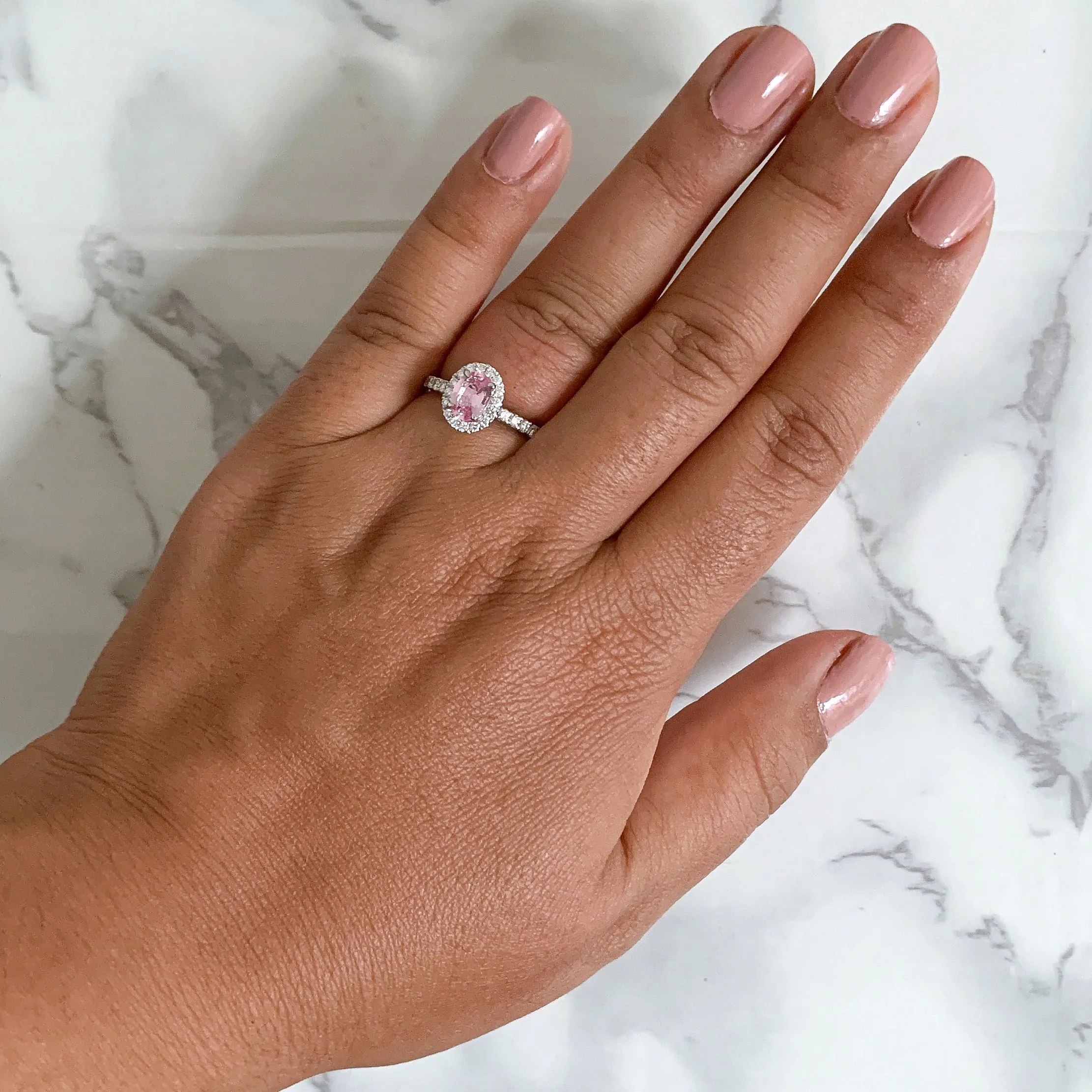 0.85ct Oval Peach Sapphire with Diamond Halo in 18K White Gold