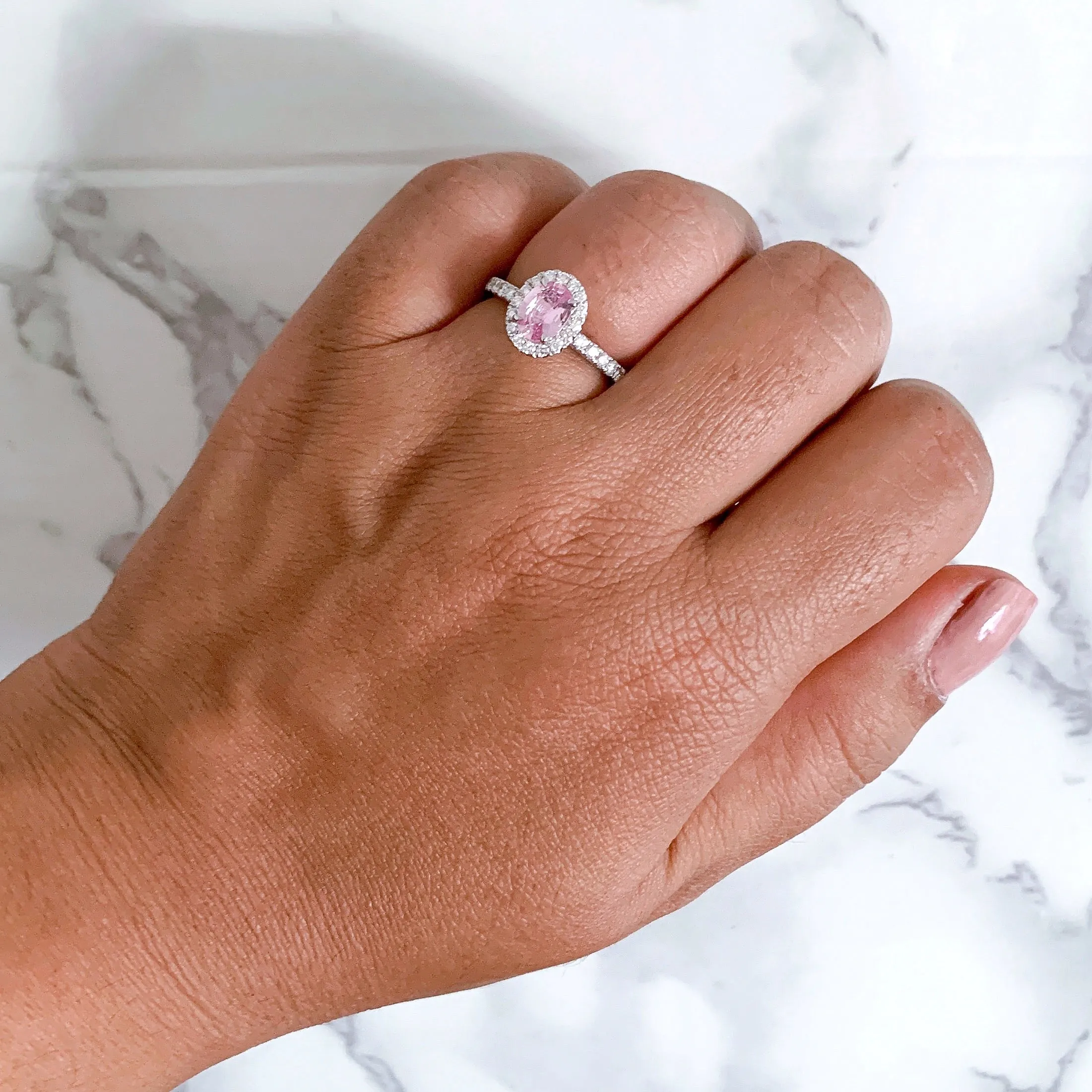 0.85ct Oval Peach Sapphire with Diamond Halo in 18K White Gold