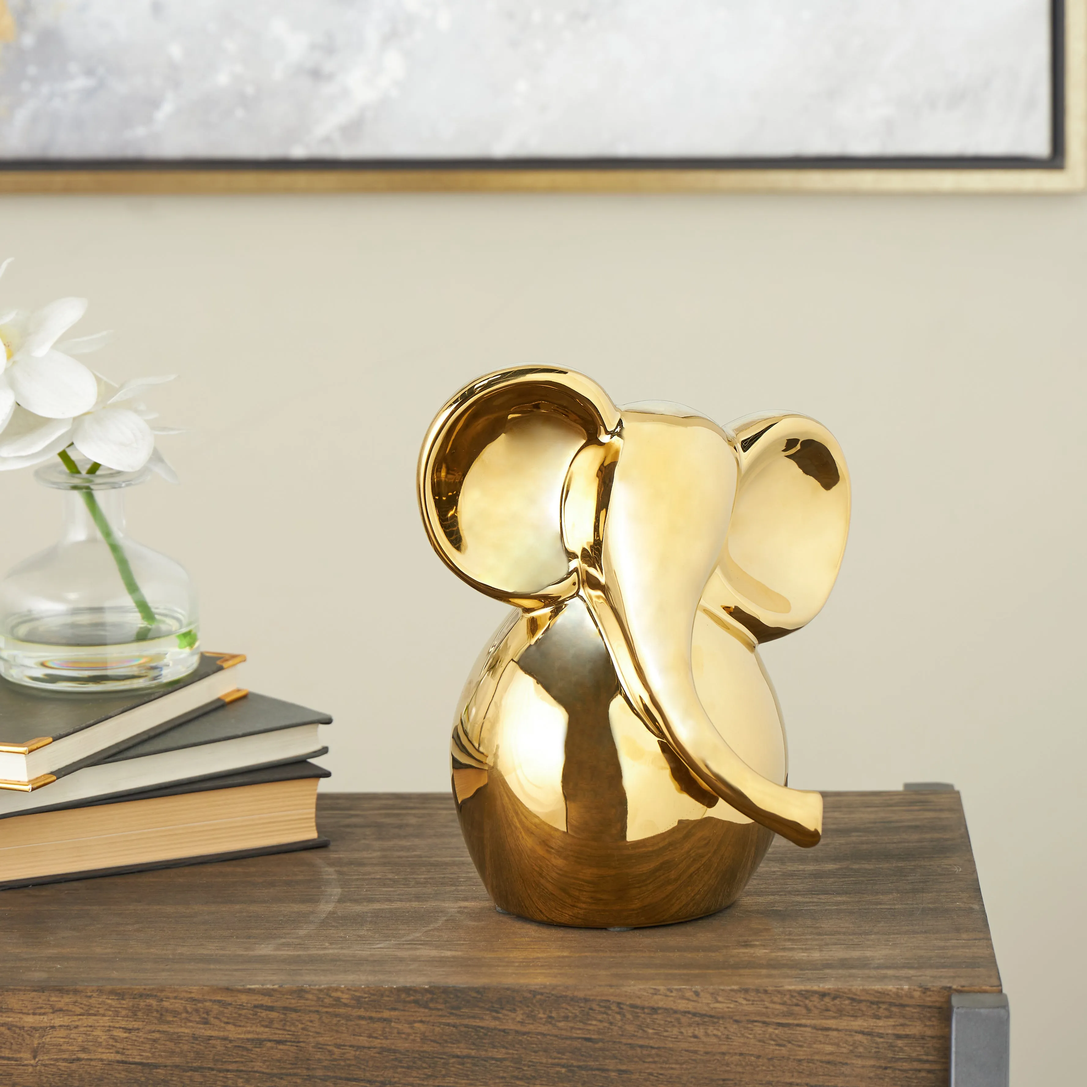 GOLD CERAMIC SHY ELEPHANT