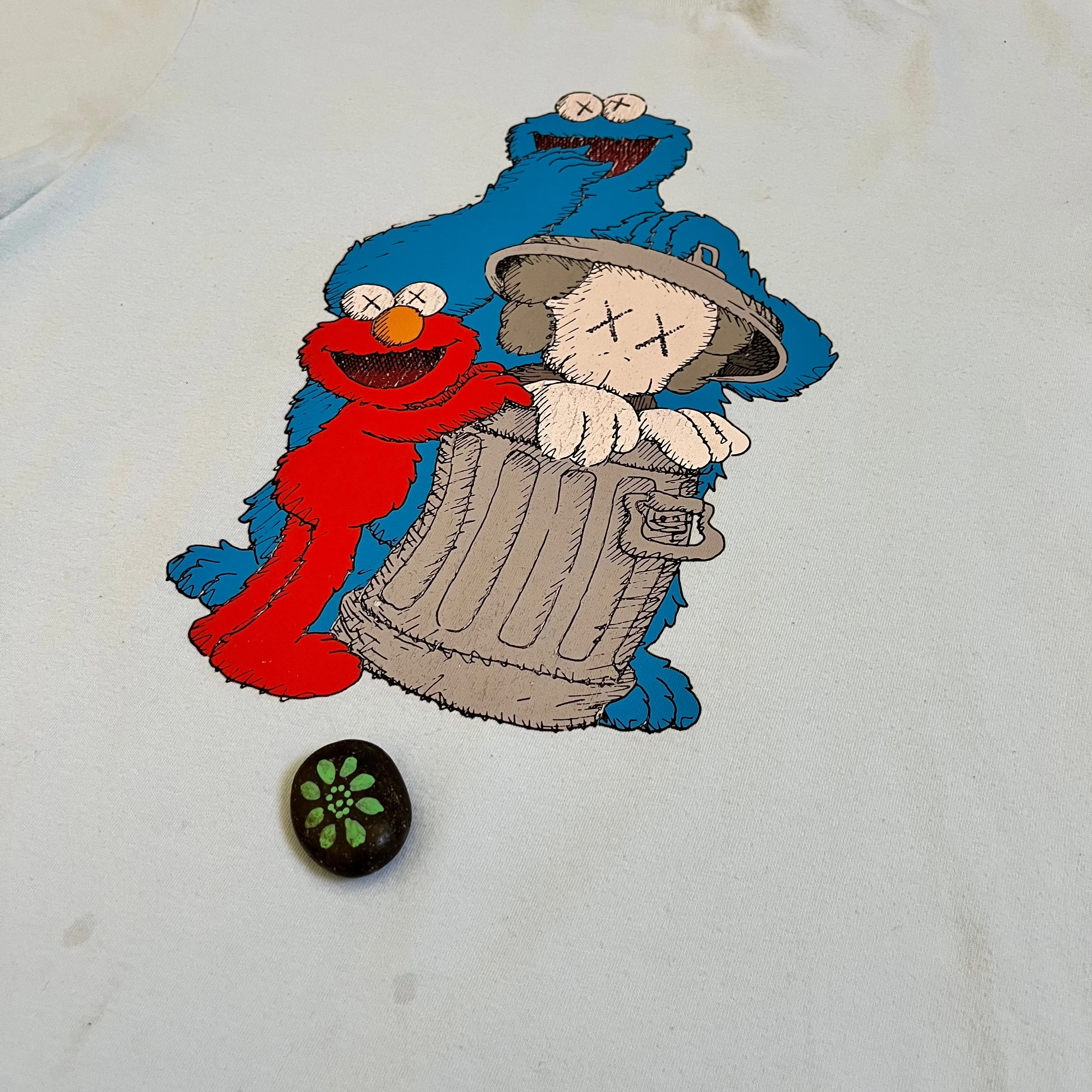 KAWS x UNIQLO x Sesame Street Companion Trash Can Tee