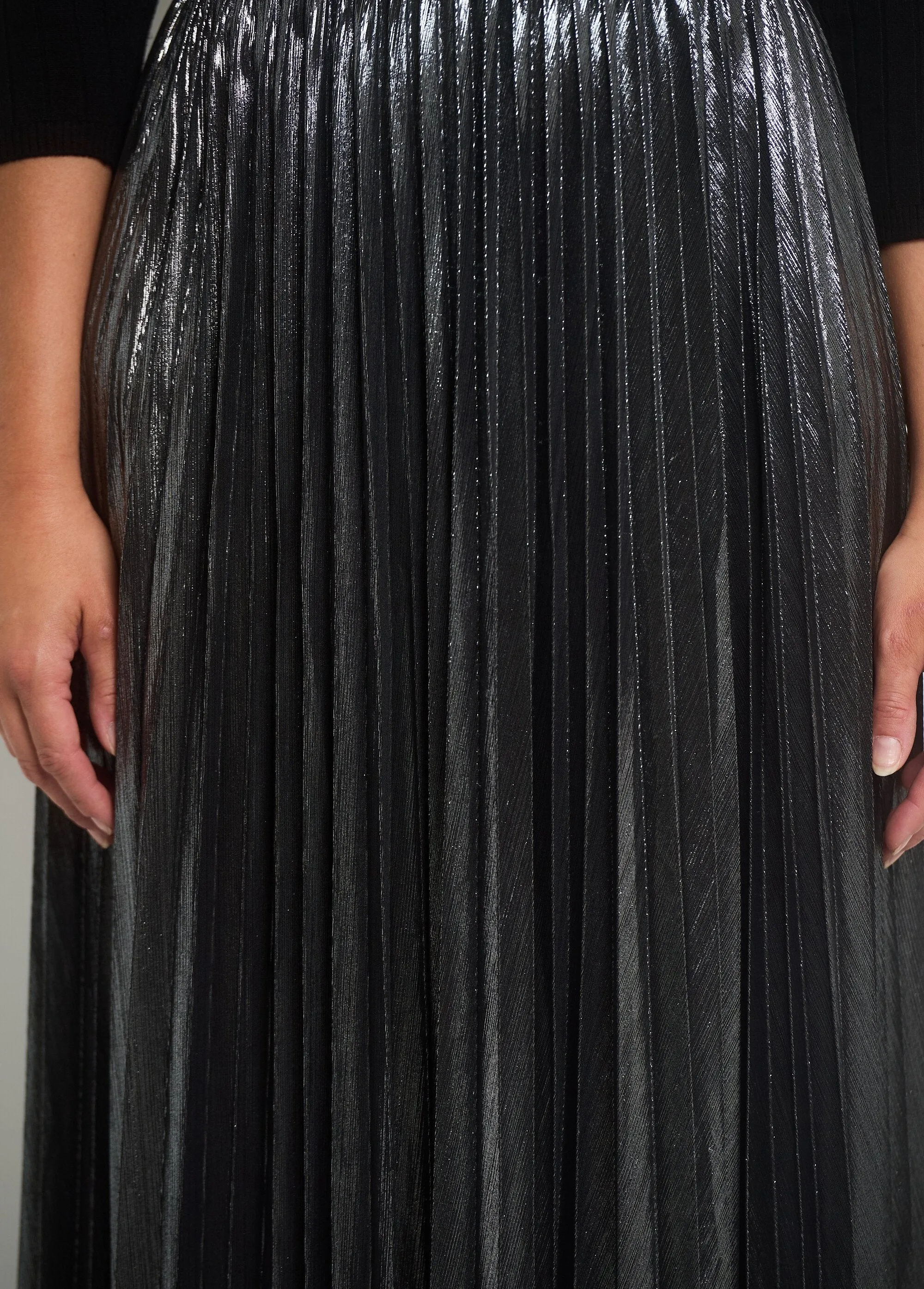 Long pleated metallic skirt