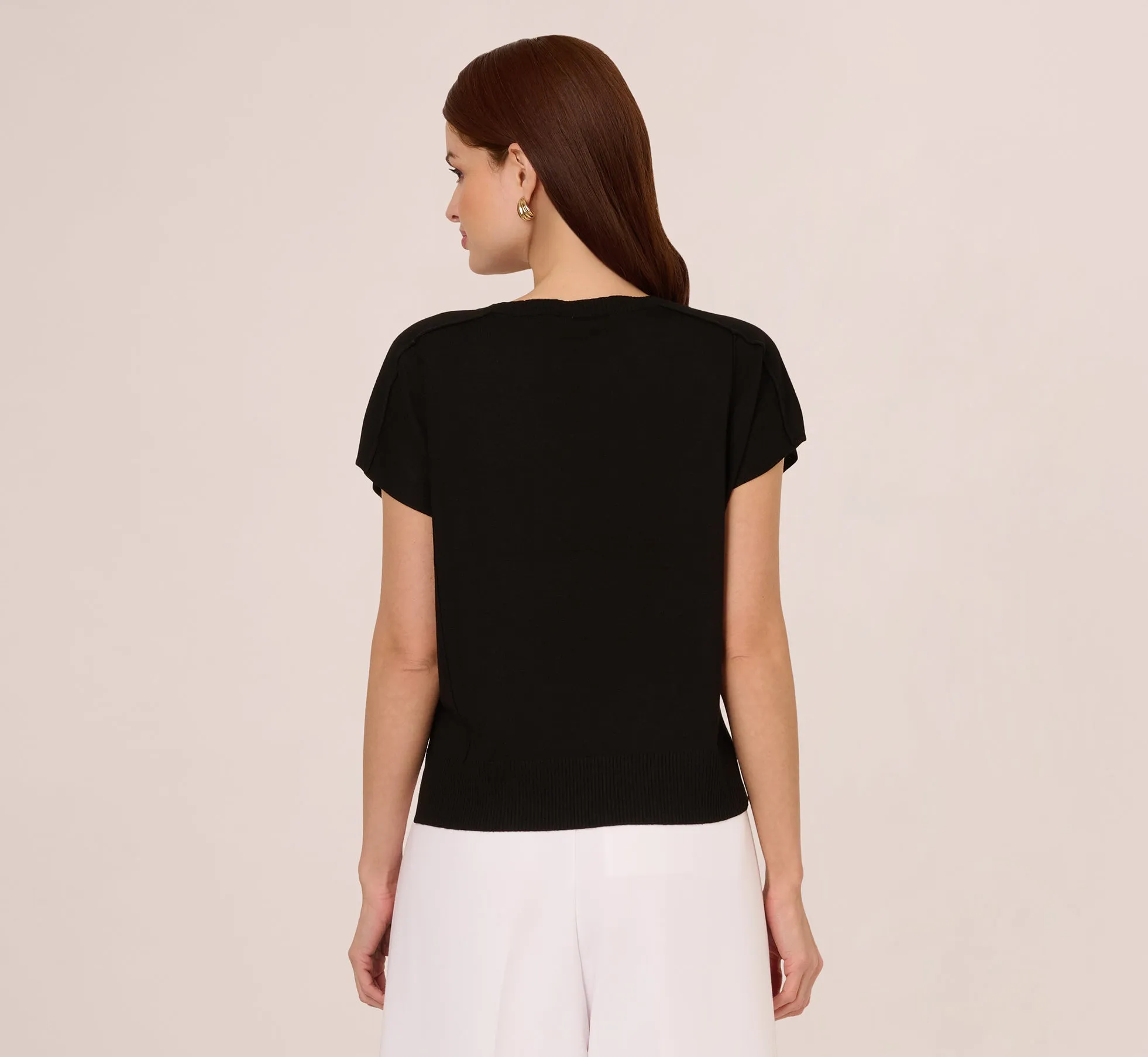 Short Sleeve Exposed Seam Pullover Sweater In Black